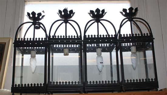 4 black painted lanterns